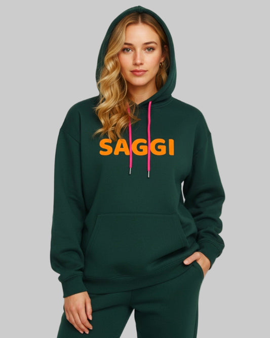Model wearing forest green SAGGI heavyweight graphic hoodie with orange logo and fuchsia drawstrings, true-to-size fit.