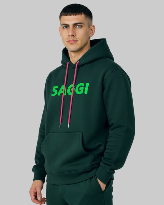 Model wearing forest green SAGGI heavyweight graphic hoodie with green logo and fuchsia drawstrings, true-to-size fit.